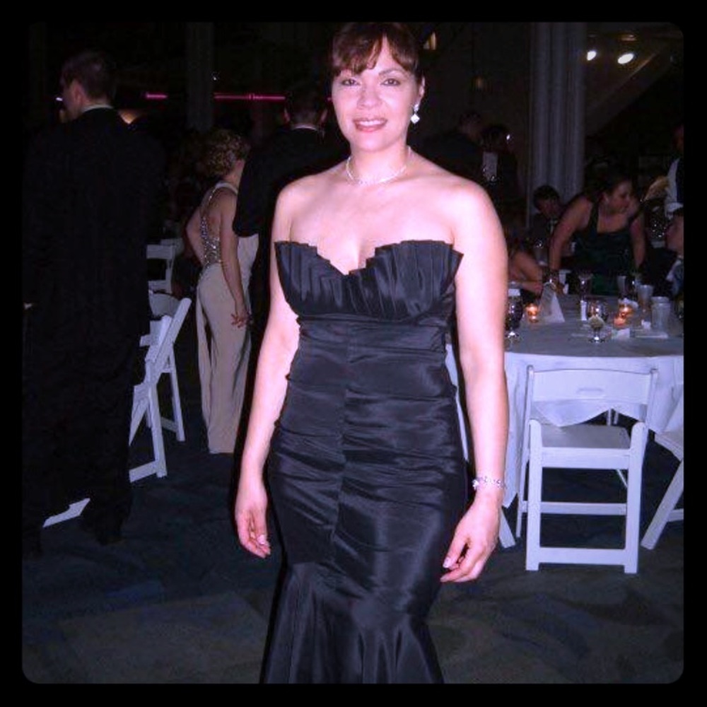 Black floor length mermaid evening dress.